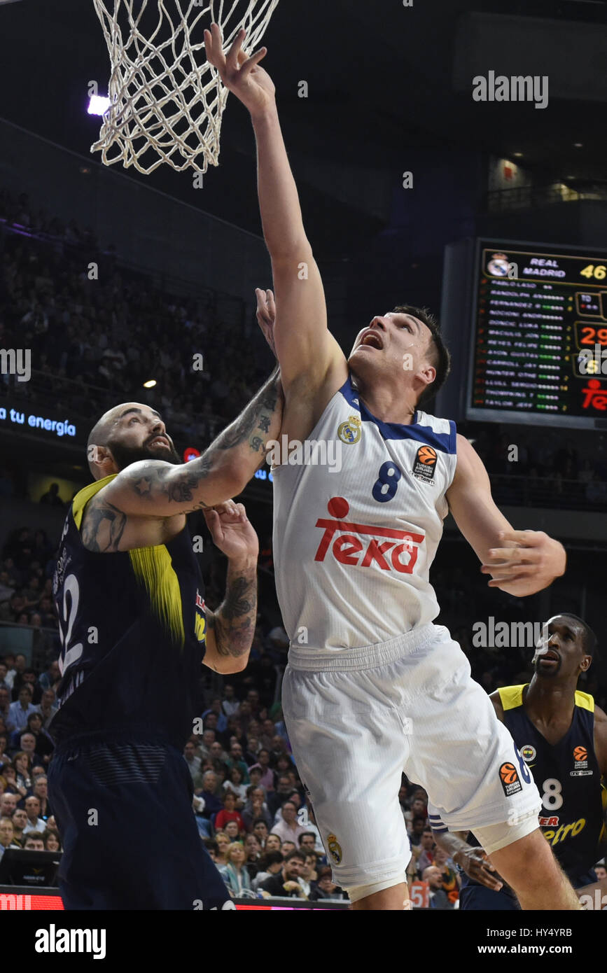 Madrid, Spain. 31st Mar, 2017. Jonas Maciulis (right) #8 of Real Madrid in action during the Euroleague basketball match between Real Madrid and Fenerbahce Istanbul at WiZink center in Madrid. Credit: Jorge Sanz/Pacific Press/Alamy Live News Stock Photo