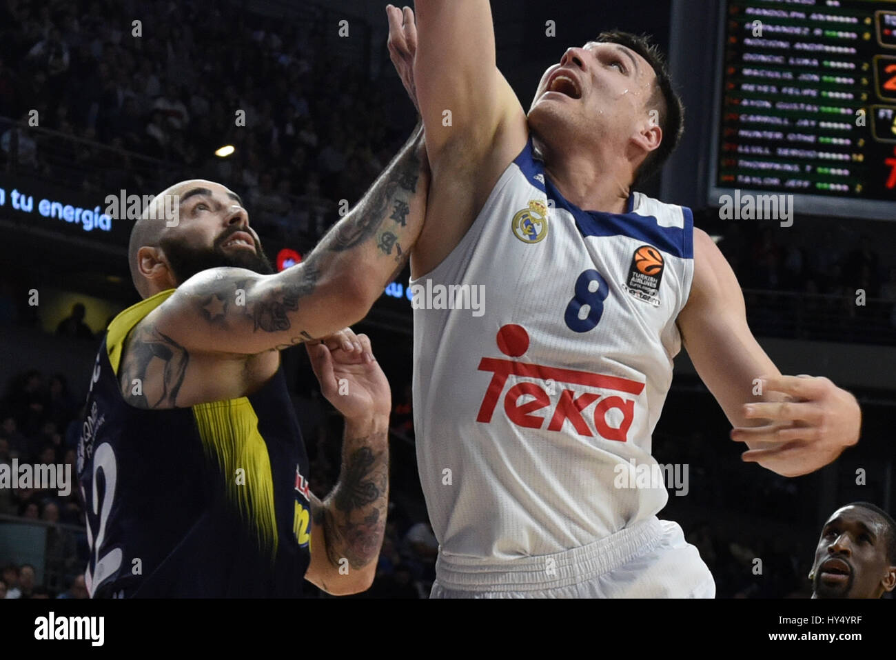 Madrid, Spain. 31st Mar, 2017. Jonas Maciulis (right) #8 of Real Madrid in action during the Euroleague basketball match between Real Madrid and Fenerbahce Istanbul at WiZink center in Madrid. Credit: Jorge Sanz/Pacific Press/Alamy Live News Stock Photo