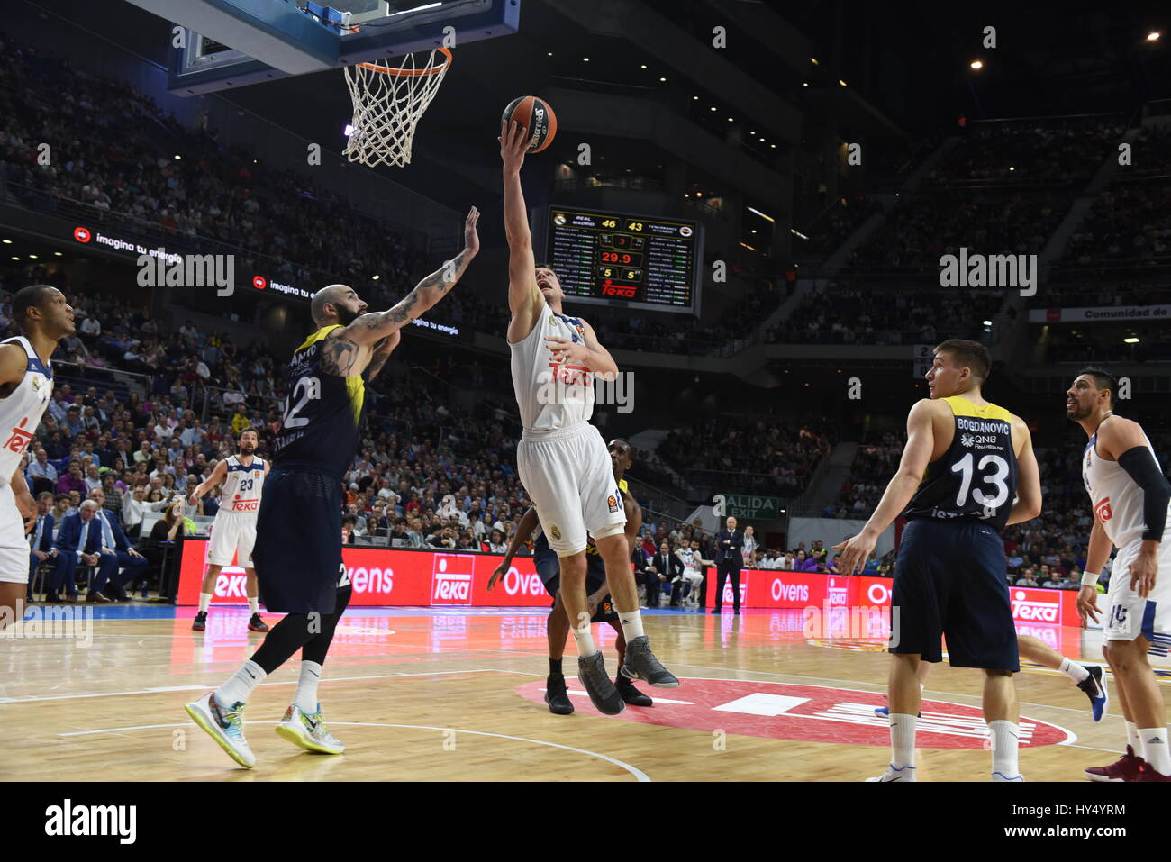 Madrid, Spain. 31st Mar, 2017. Jonas Maciulis (center) #8 of Real Madrid in action during the Euroleague basketball match between Real Madrid and Fenerbahce Istanbul at WiZink center in Madrid. Credit: Jorge Sanz/Pacific Press/Alamy Live News Stock Photo