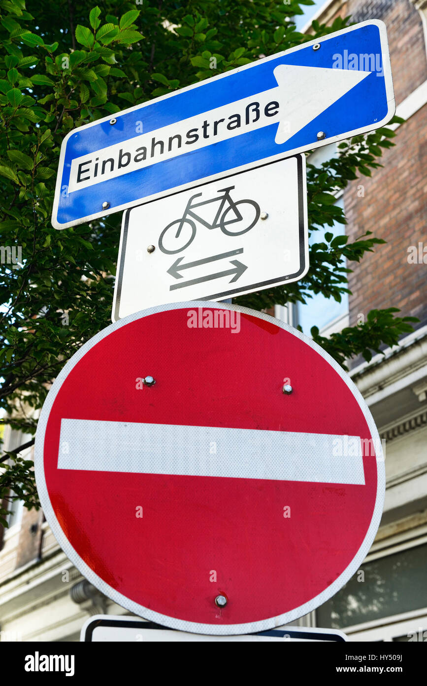 One-way street may be driven on by bicycles in both directions, road signs in Hamburg, Einbahnstra?e darf von Fahrraedern in beide Richtungen befahren Stock Photo
