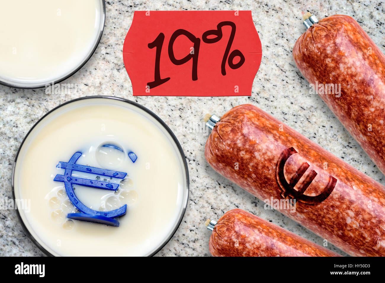 Milk and sausage with eurosign, proposal of a raised tax rate for milk products and meat products, Milch und Wurst mit Eurozeichen, Vorschlag eines er Stock Photo