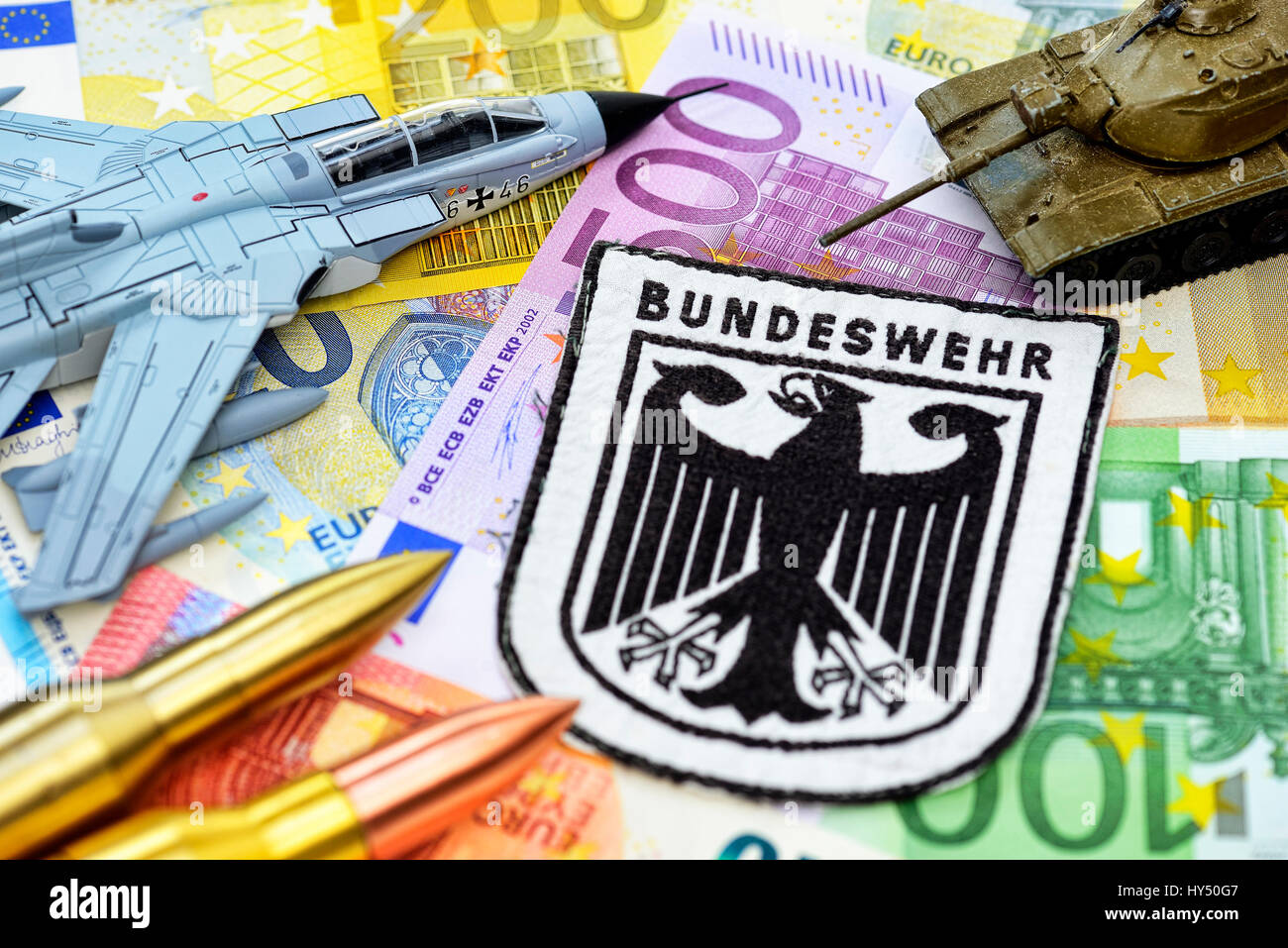 Armed forces badges on bank notes, rise of the military expenses, Bundeswehr-Abzeichen auf Geldscheinen, Erhoehung der Militaerausgaben Stock Photo