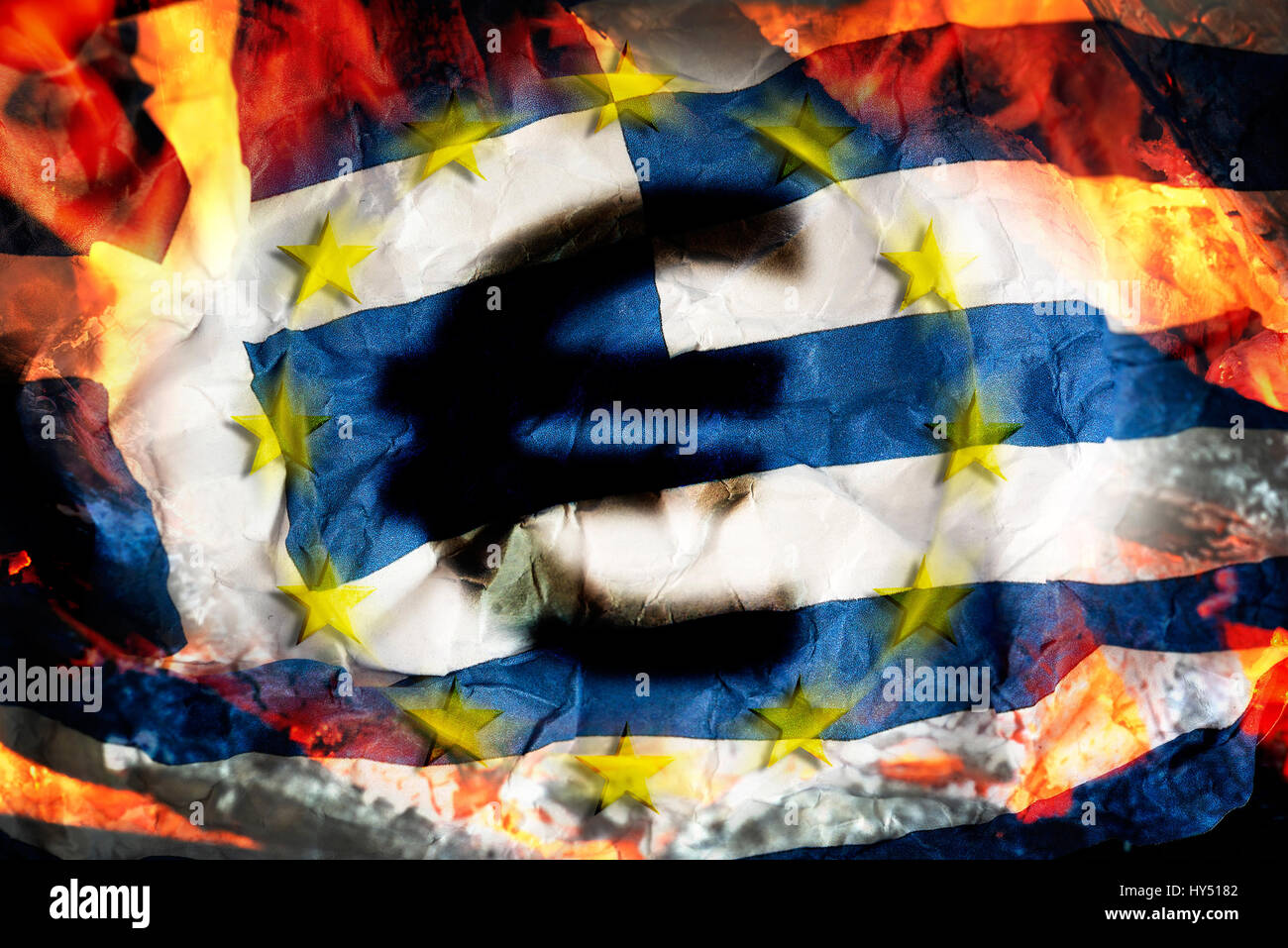 Greek flag with flames and eurosigns, symbolic photo debt quarrel, Griechische Fahne mit Flammen und Eurozeichen, Symbolfoto Schuldenstreit Stock Photo