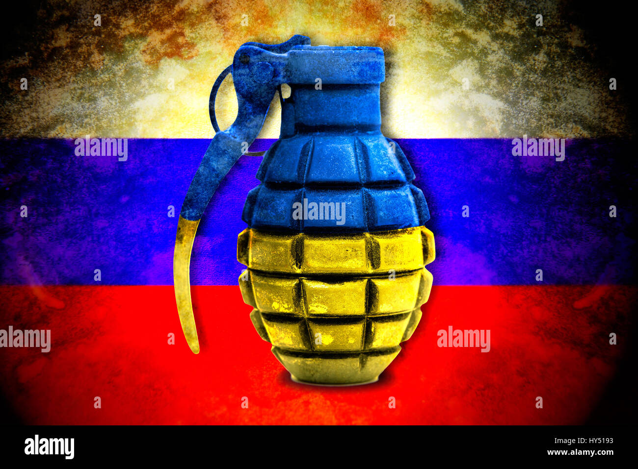 Grenade in Ukrainian national colours before Russia flag, symbolic photo Ukraine conflict, Handgranate in ukrainischen Landesfarben vor Russlandfahne, Stock Photo
