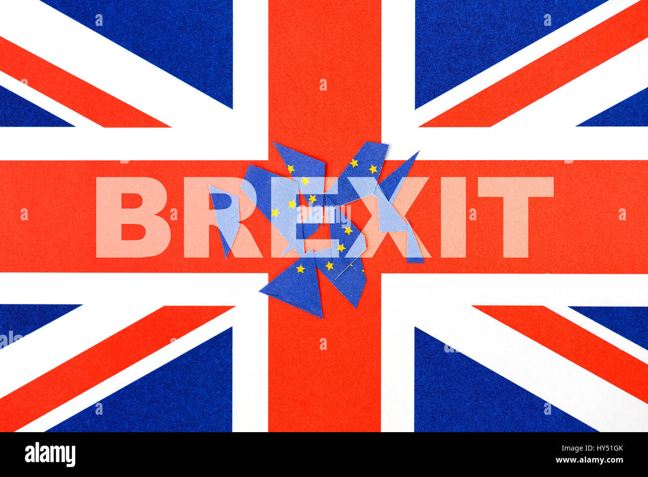 Flag of Great Britain and cut flag of the EU, symbolic photo Brexit, Fahne von Gro?britannien und zerschnittene Fahne der EU, Symbolfoto Brexit Stock Photo