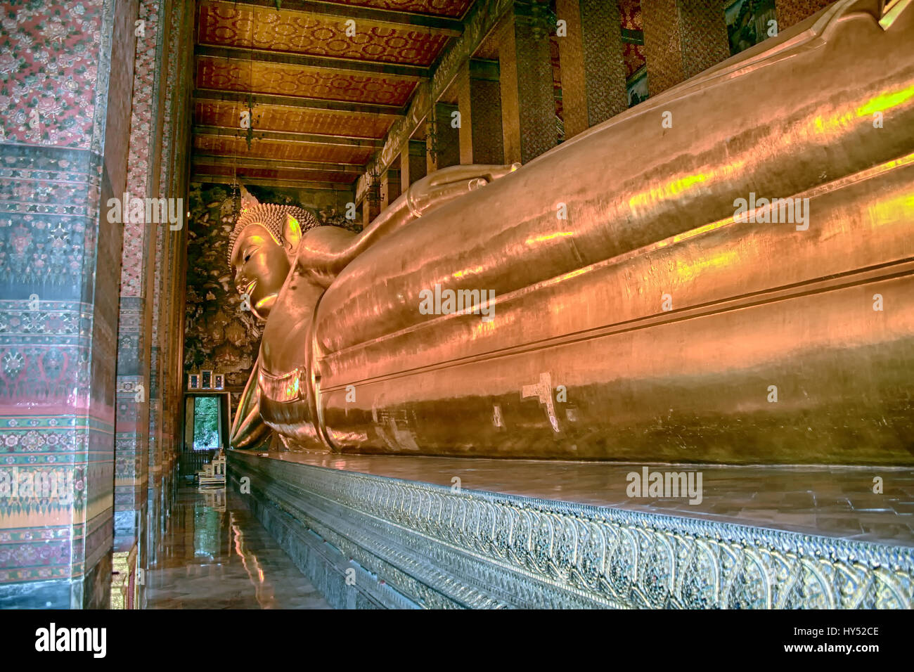 Giant golden reclining Buddha at Wat Pho in Bangkok Thailand Stock ...