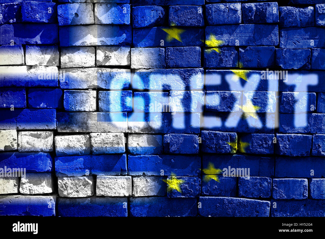 Greece and EU flag on ailing stone wall with stroke Grexit, Griechenland- und EU-Fahne auf maroder Steinmauer mit Schriftzug Grexit Stock Photo