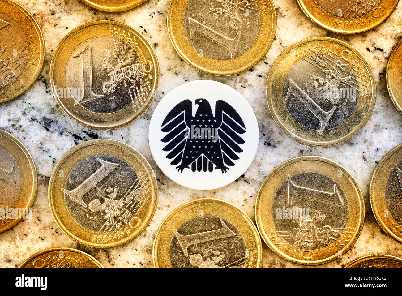 Monetary coins and federal eagles, parliamentary pay rise, Geldmuenzen und Bundesadler, Diaetenerhoehung Stock Photo
