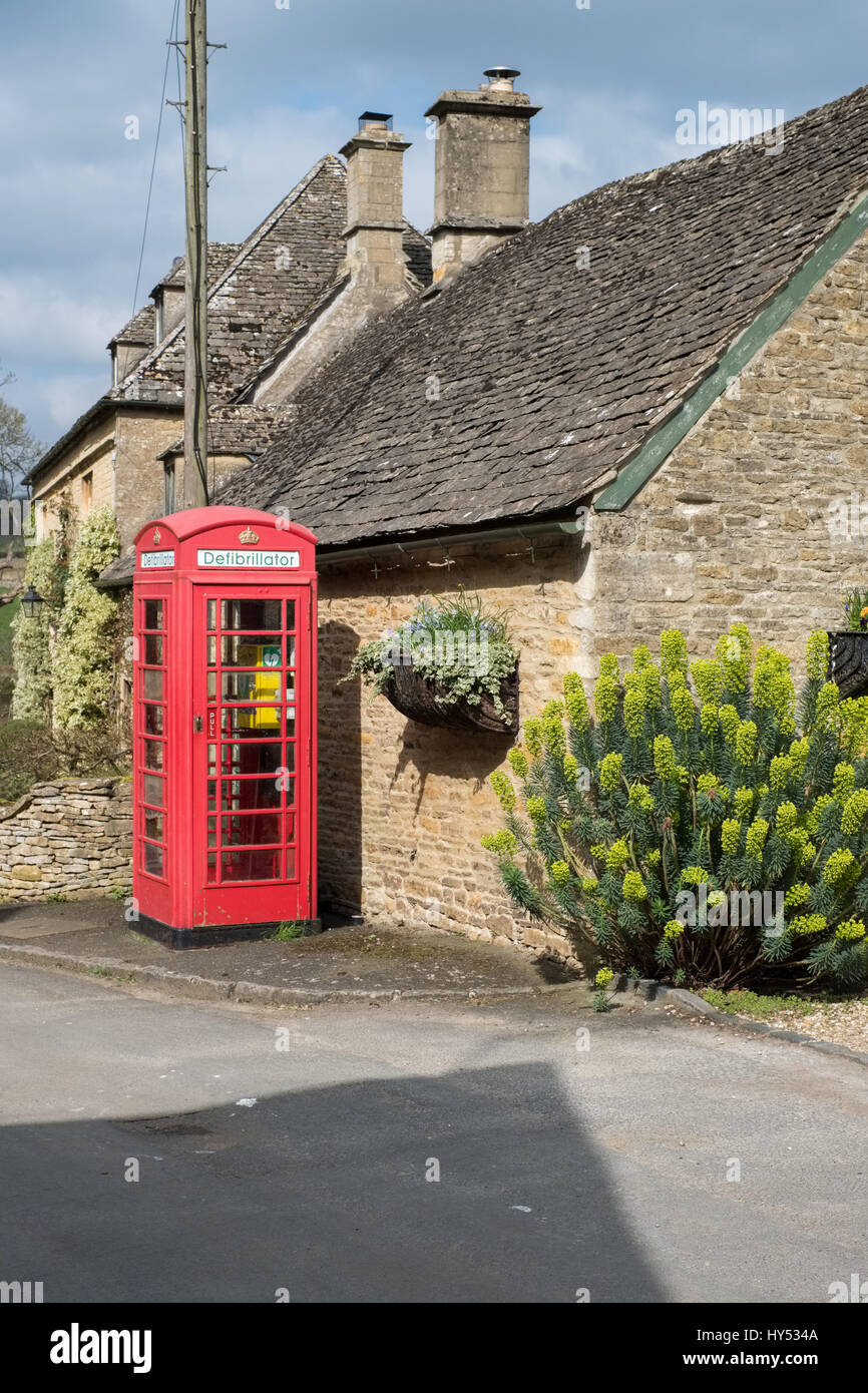 Defibrillator in and Old Phone Box in Upper Slaughter Village Stock Photo