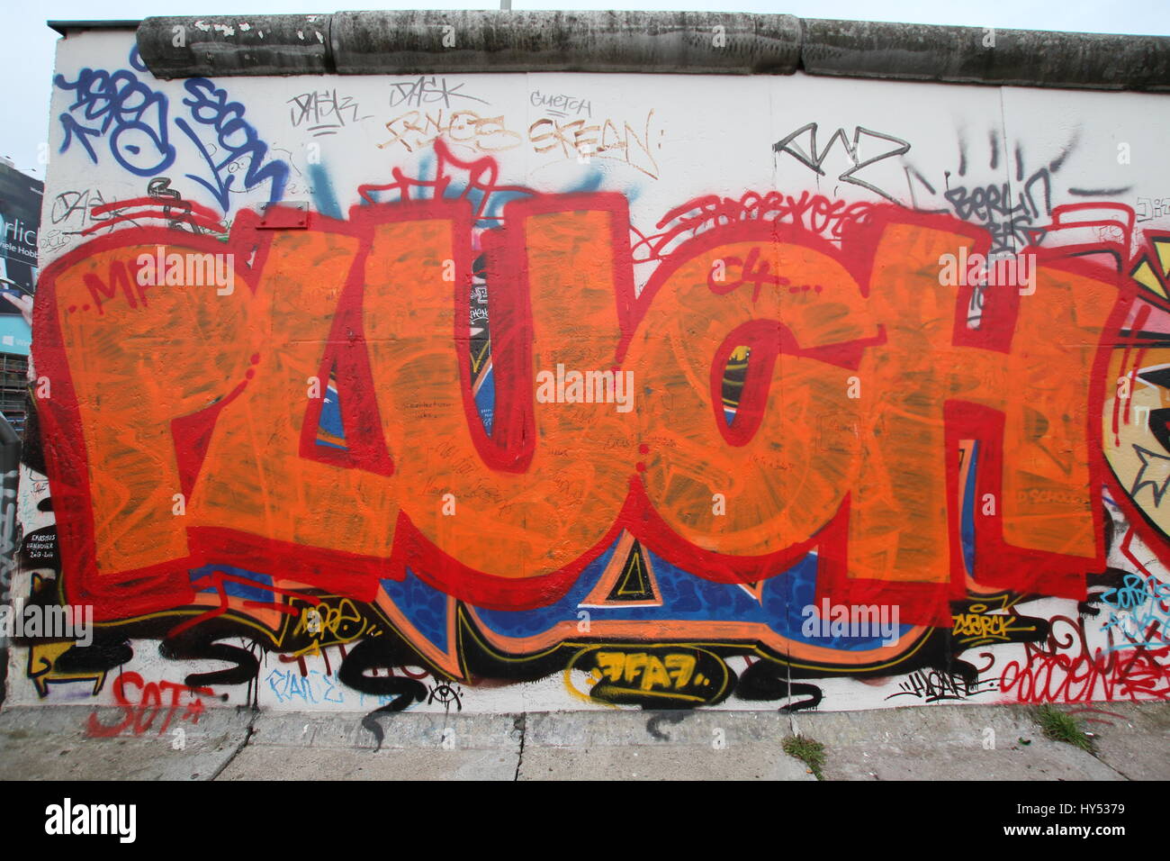 Different photos of graffiti in the historic east and west side of the Berlin wall. Stock Photo