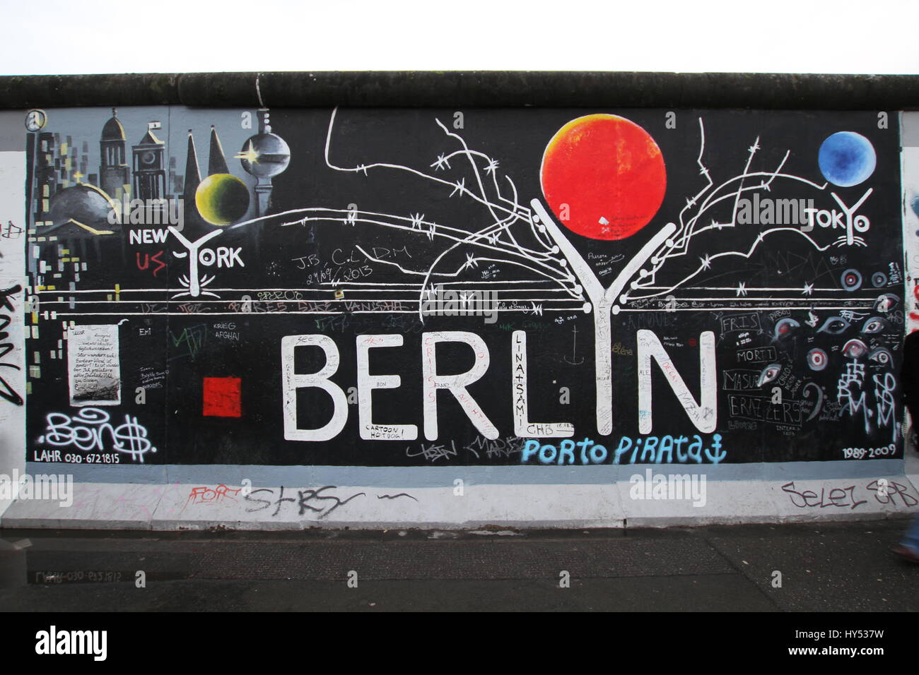 Different photos of graffiti in the historic east and west side of the Berlin wall. Stock Photo