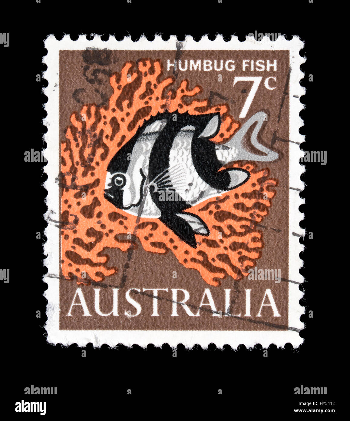 Postage stamp from Australia depicting a humbug fish or Three-Stripe Damsel (Dascyllus aruanus) Stock Photo