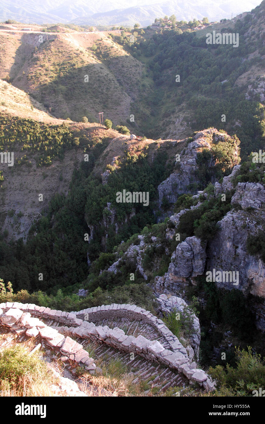 The giant stone steps of Vradeto village and the Beloi viewpoint 0f Vicos Canyon, Zagoria villages, Epirus region, Greece Stock Photo