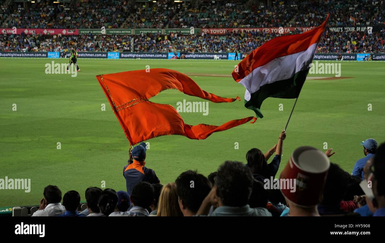 Saffron Hindu flag and Indian flag waved during India Australia cricket match in Sydney Australia. Stock Photo