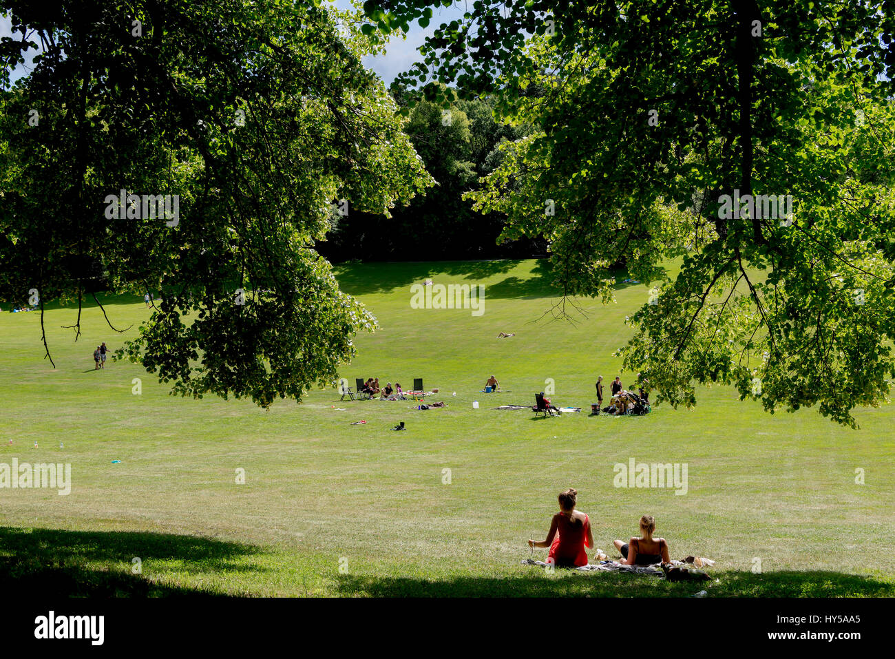 Sweden, Uppland, Stockholm, Hagaparken, Public park with resting people Stock Photo