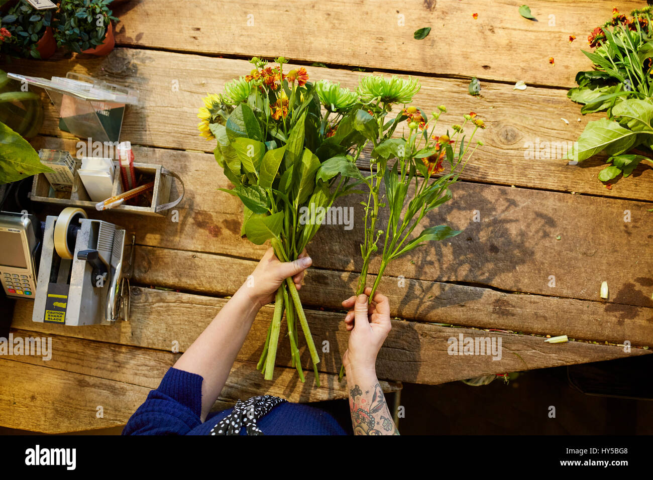 Sweden, Florist working in flower shop Stock Photo Alamy