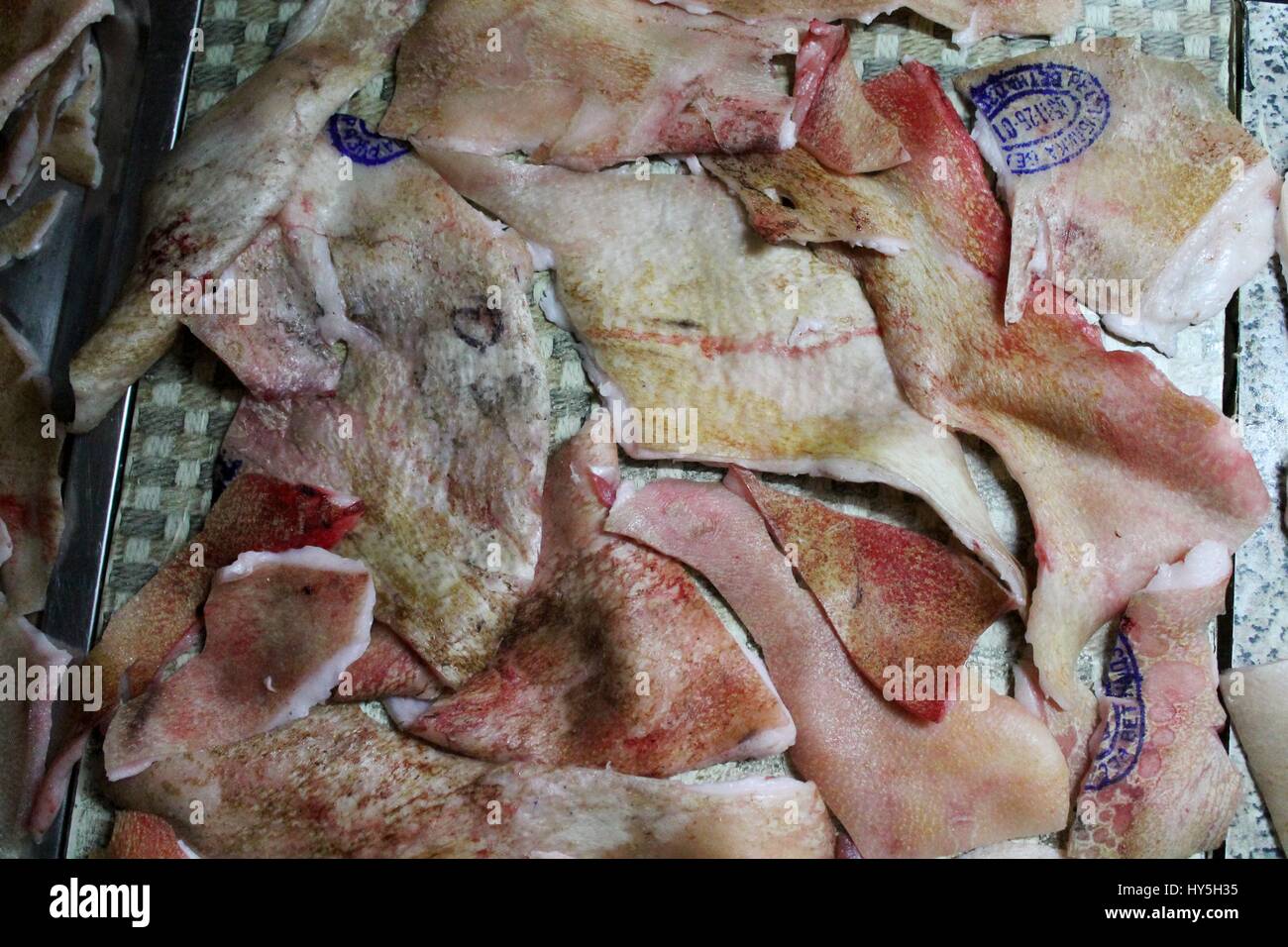 fresh pink pork skin with blood use in many industry begin from cook , technology and fashion Stock Photo
