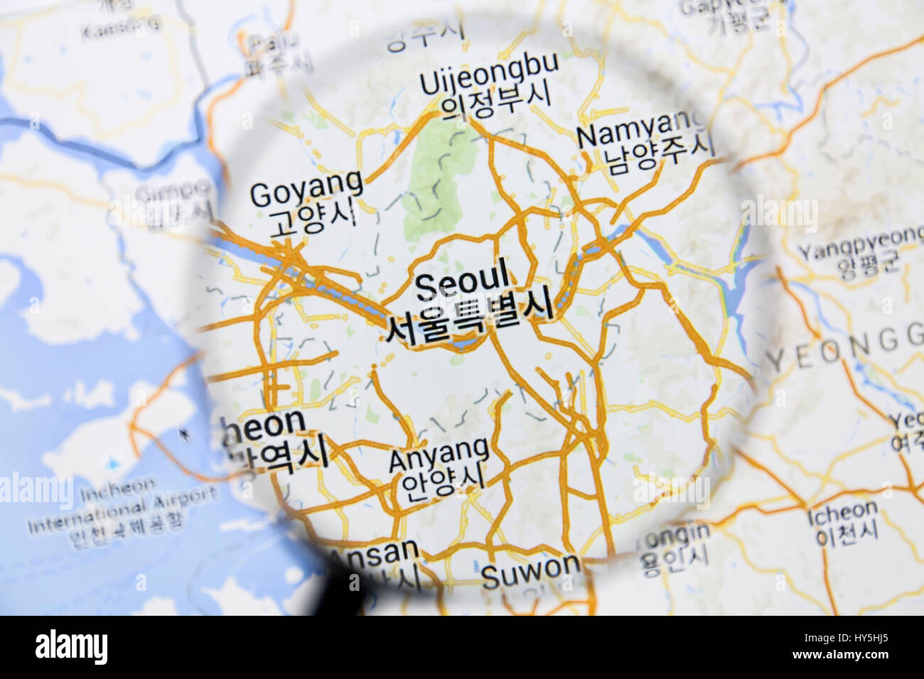 Map of Seoul on Google Maps under a magnifying glass. Seoul is the capital city of South Korea Stock Photo