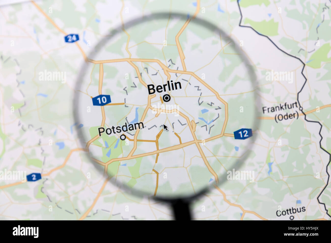 Berlin map. Map of Berlin on Google Maps under a magnifying glass. Berlin is the capital city of Germany Stock Photo
