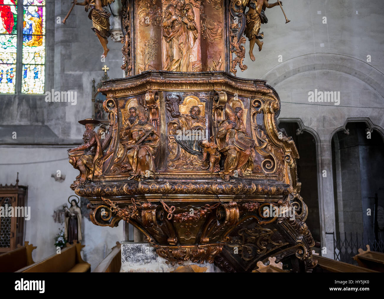 Wooden pulpit in Gothic-style Roman Catholic church of Saint Michael, located on Union Square in Cluj Napoca, second most populous city in Romania Stock Photo