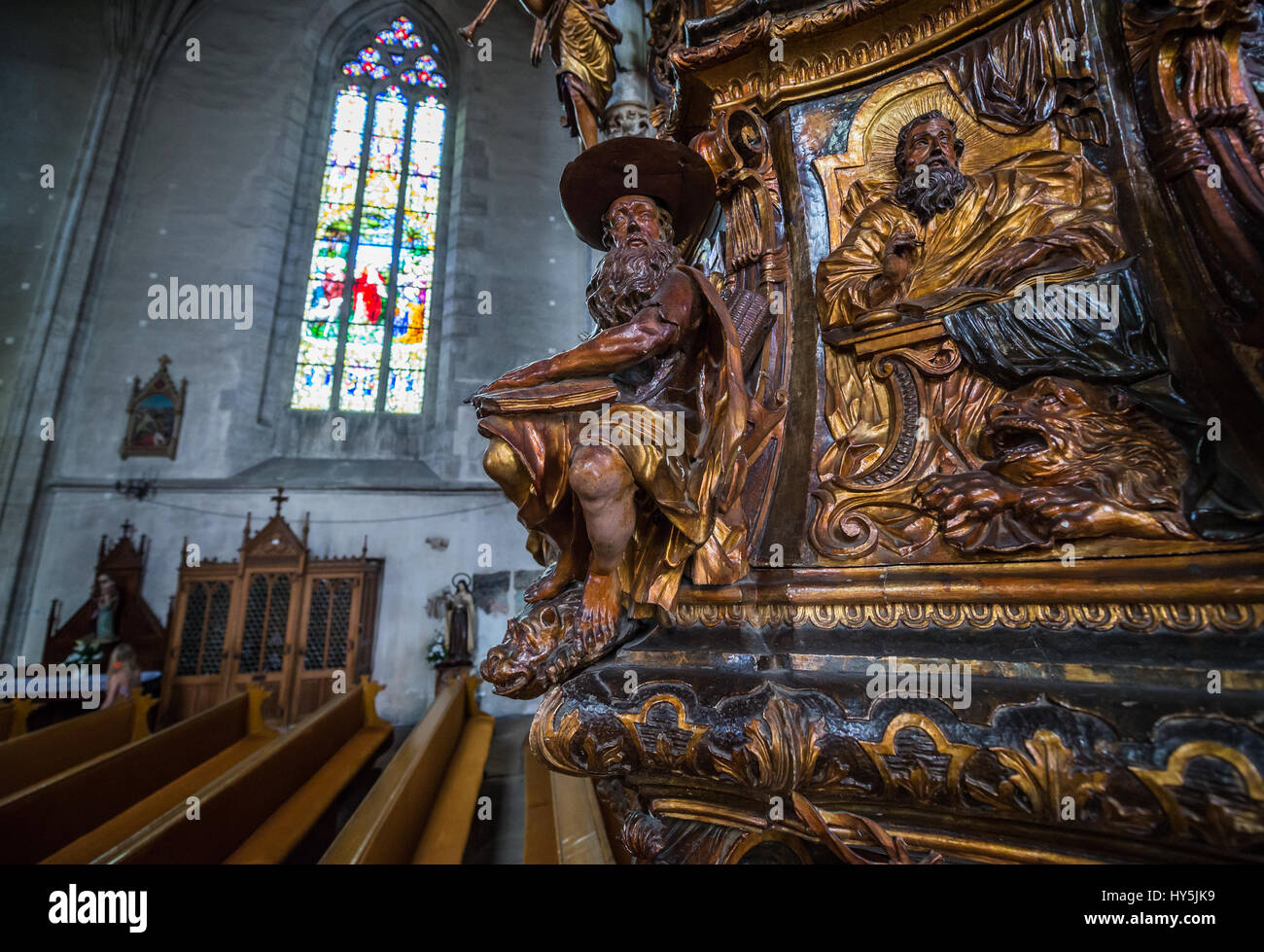 Wooden pulpit in Gothic-style Roman Catholic church of Saint Michael, located on Union Square in Cluj Napoca, second most populous city in Romania Stock Photo