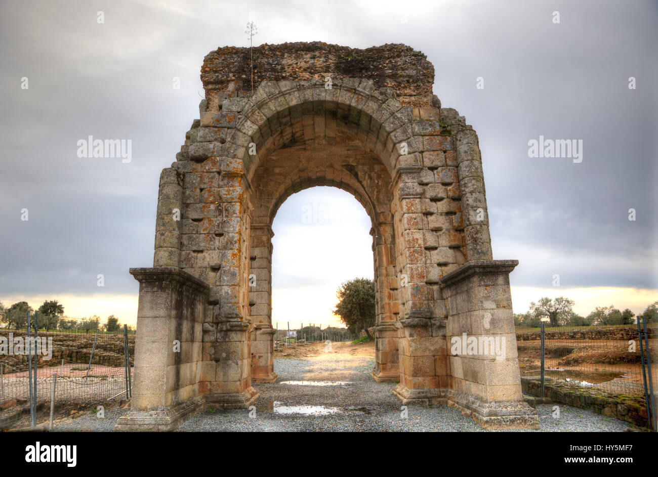 Roman Arch of Caparra, (1st-2nd century AD). Crossroad ancient city ruins at Silver Route Stock Photo