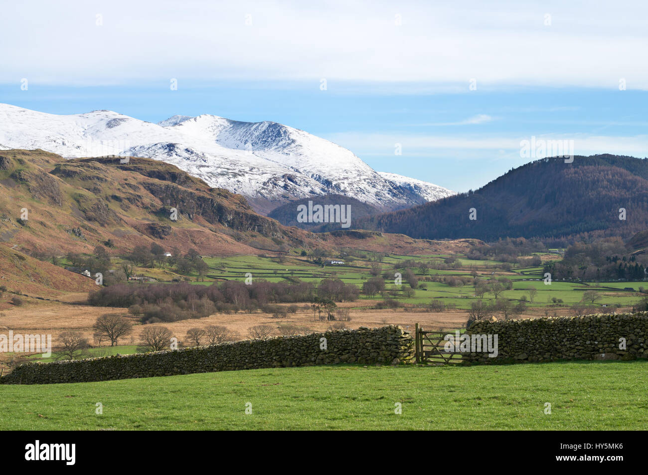 Snow capped Helvellyn seen from Castlerigg, Cumbria, England, UK Stock Photo
