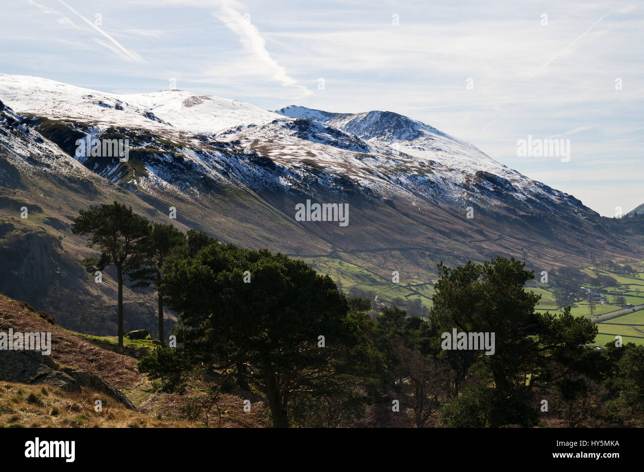Snow capped Helvellyn seen from High Rigg, St John's in the Vale, Cumbria, England Stock Photo