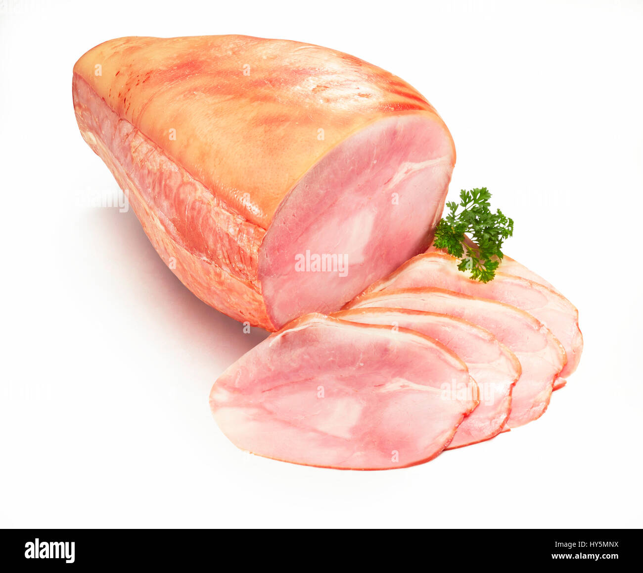 Ham with parsley (Petroselinum crispum) as decoration, clipping path available Stock Photo