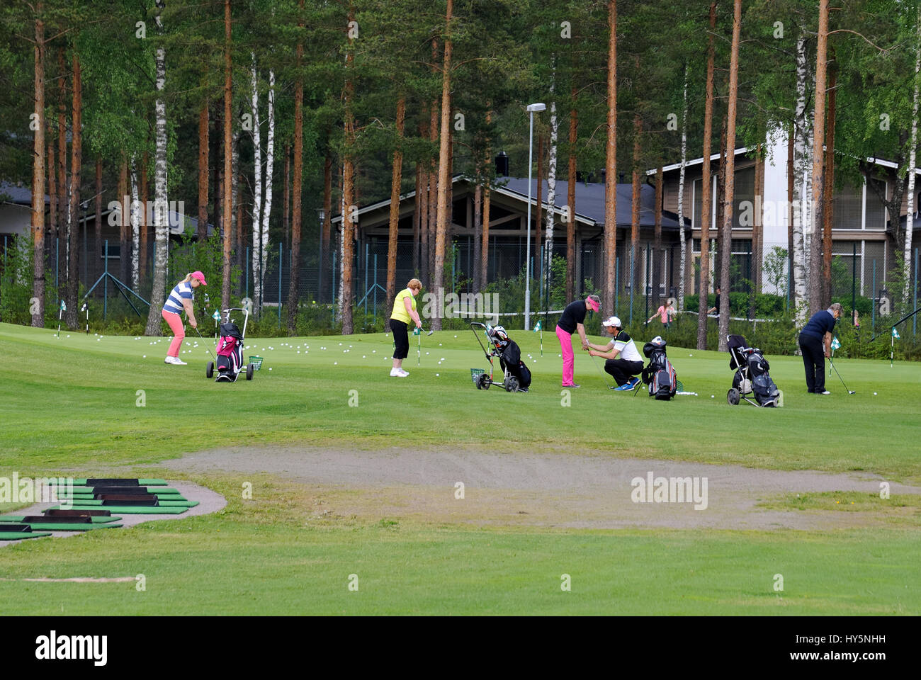 VIERUMAKI, FINLAND, June 23: Golf Players hold training session at the  sports centre for the game of Golf Vierumaki, one of the most favorite in  Finla Stock Photo - Alamy