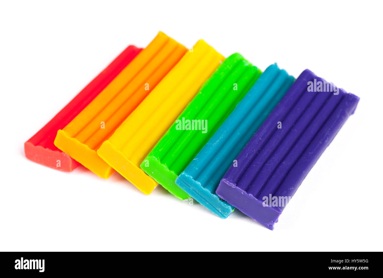A set of colorful plasticine, modeling clay isolated on white background.  Plasticine for children or professional modeling Stock Photo - Alamy