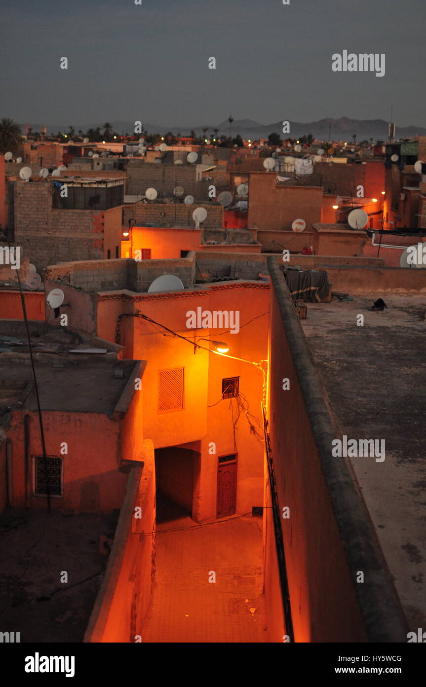 The empty alley during the breaking of the dawn in the Bab Taghzout suburb area in Marrakesh, Morocco. Stock Photo
