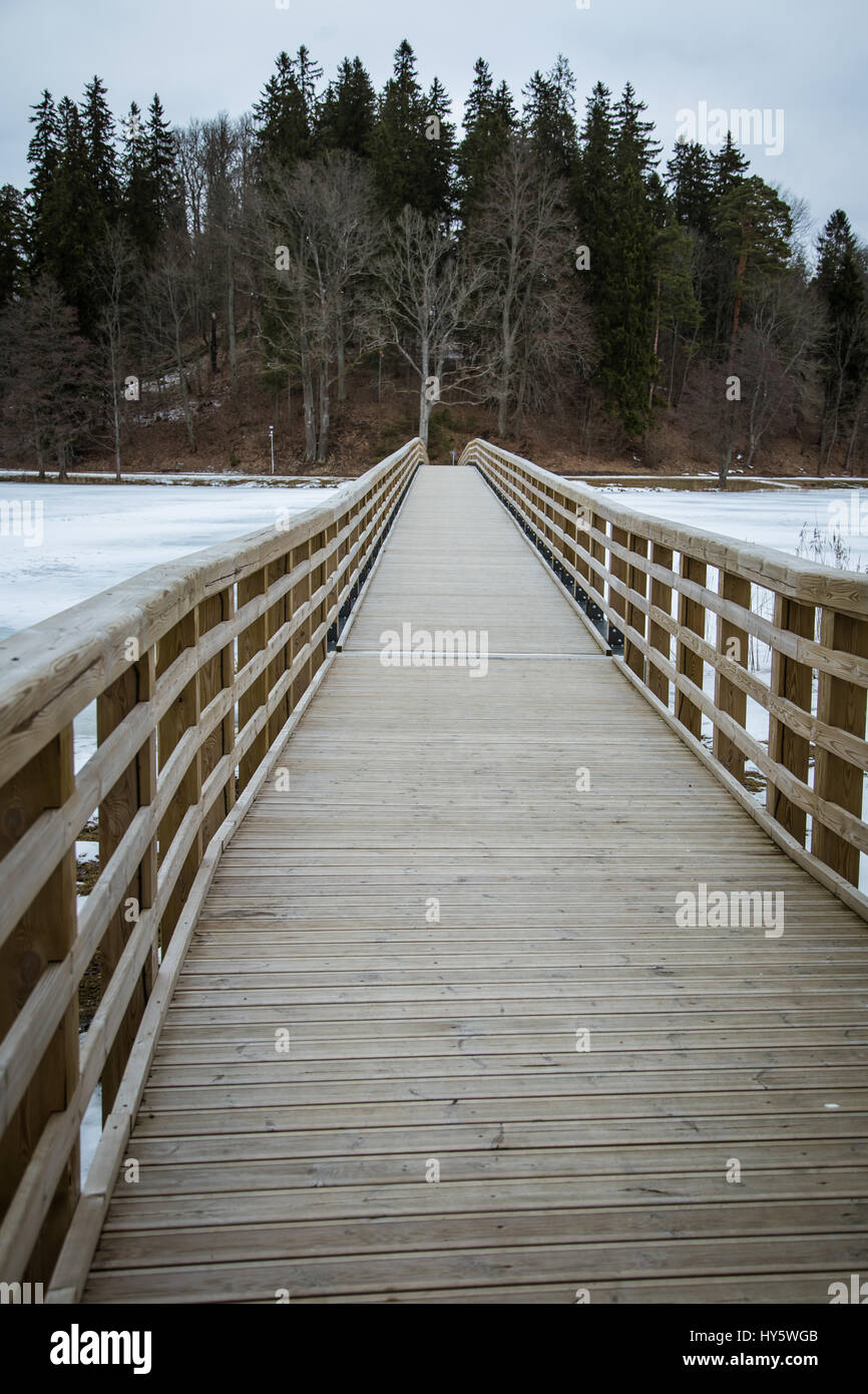 Wooden plank bridge with railings hi-res stock photography and images ...
