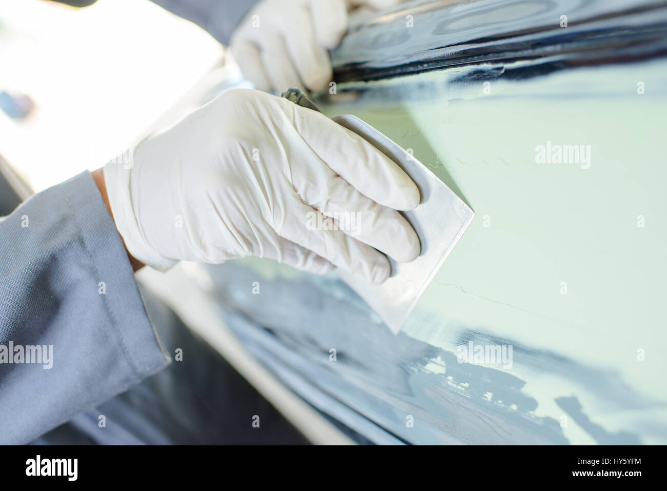 Man sanding metal Stock Photo Alamy