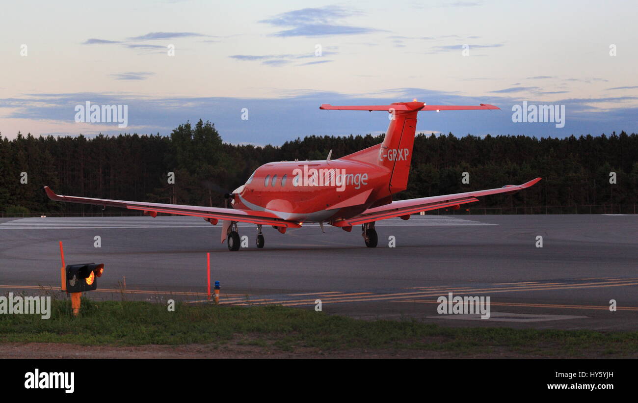Pilatus PC12/47E C-GRXP Ornge at YOW, Ottawa International Airport, Canada, June 04, 2015. Ornge is the non-profit organization providing air ambulanc Stock Photo