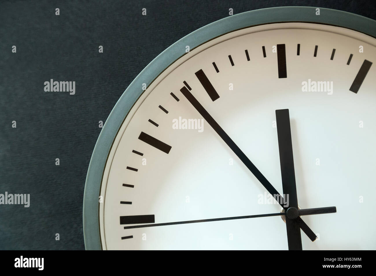 Clock showing six minutes to twelve Stock Photo - Alamy
