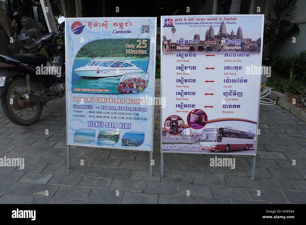 bus and boat ticket ads in Siam Reap Stock Photo