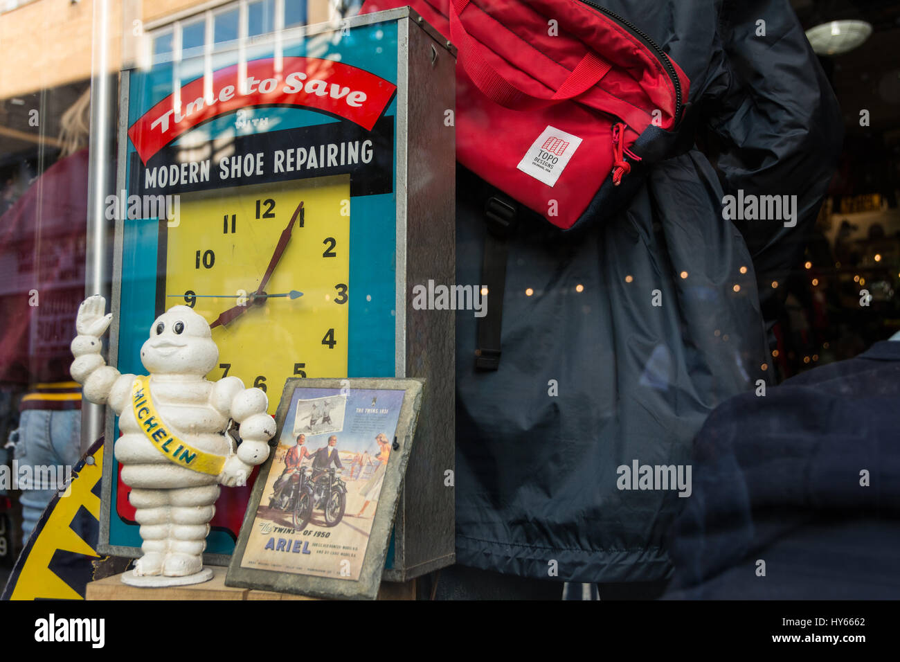 Bibendum, the Michelin Man, on display in a window in Spitalfields, London, UK Stock Photo