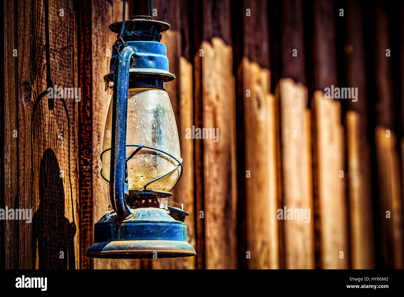 A lamp haning on a southern California ranch wall Stock Photo