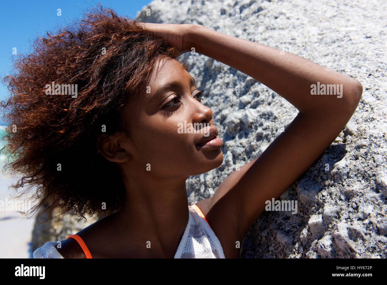 Close up portrait of a young african american woman posing outdoors ...