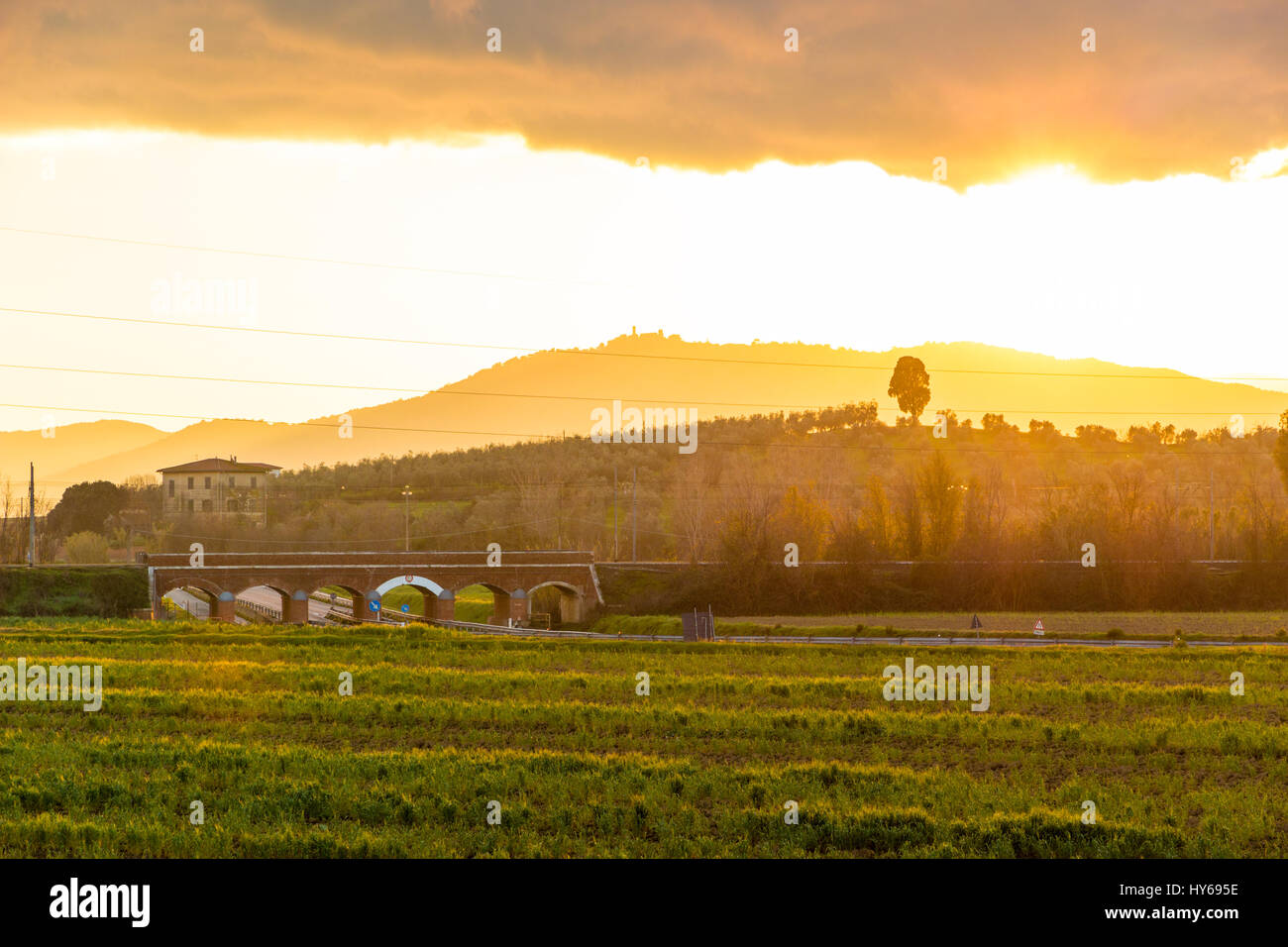 Railway bridge over road in Tuscany, Italy Stock Photo