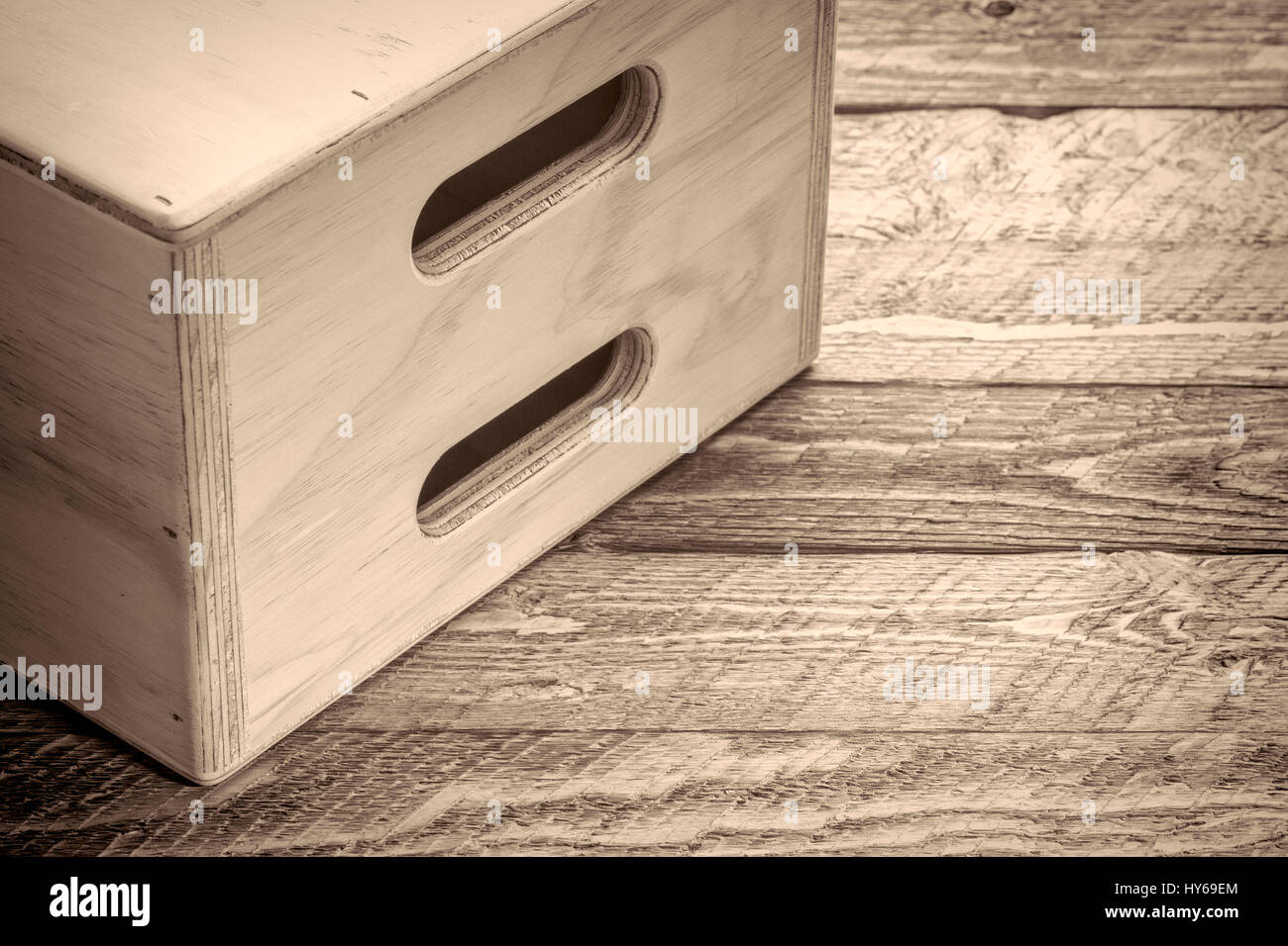 apple box - film set equipment, abstract in black and white with retro platinum toning Stock Photo