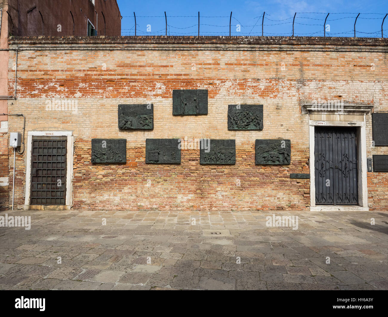 Bronze wall plaques depicting the Holocaust in the Venetian Ghetto Stock Photo
