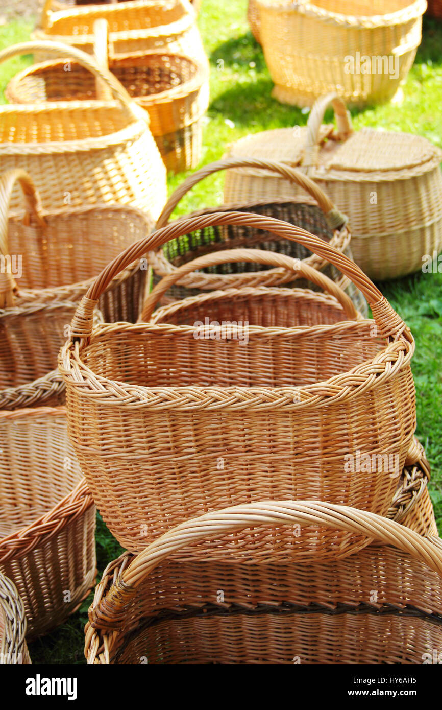 Many Wicker baskets in a street market on grass field Stock Photo - Alamy