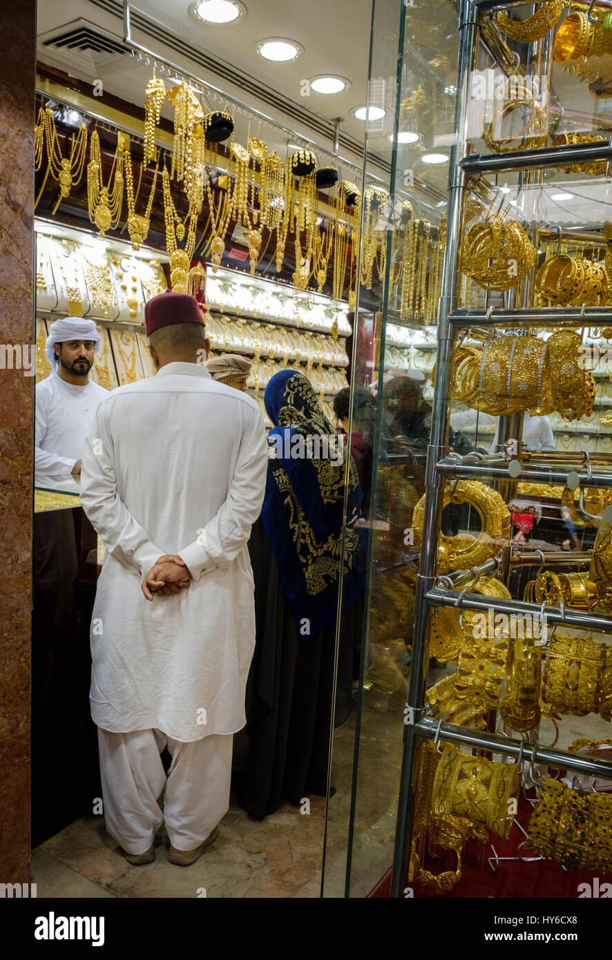 UNITED ARAB EMIRATES, DUBAI - CIRCA JANUARY 2017: Locals shopping for jewelry at the famous Gold Souq in Dubai Stock Photo