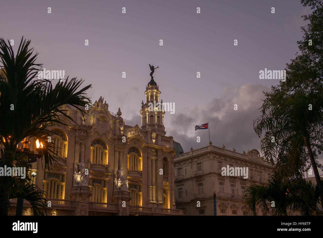 Gran Teatro de Cuba at night with vintage cars on the street Stock ...