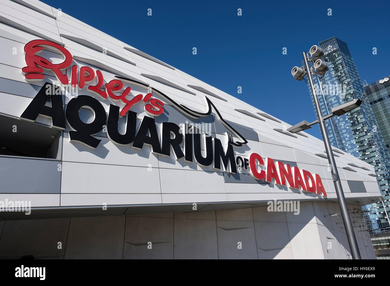 Ripleys Aquarium of Canada side view with logo and Toronto skyline on ...