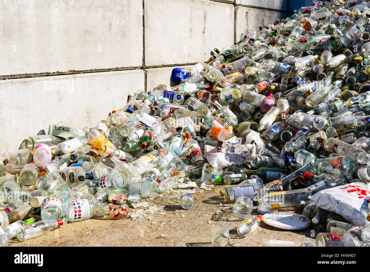 Ronneby, Sweden - March 27, 2017: Documentary of public waste station. Large pile of clear glass destined for recycling. Stock Photo