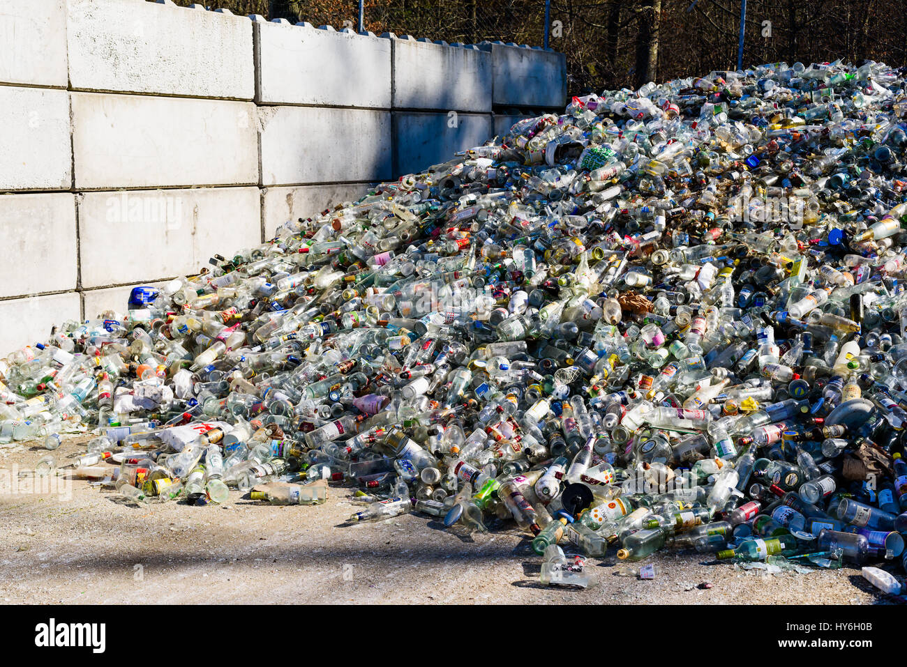 Ronneby, Sweden - March 27, 2017: Documentary of public waste station. Large pile of clear glass destined for recycling. Stock Photo