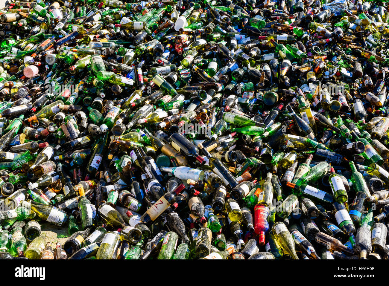 Ronneby, Sweden - March 27, 2017: Documentary of public waste station. Large pile of colored glass destined for recycling. Stock Photo